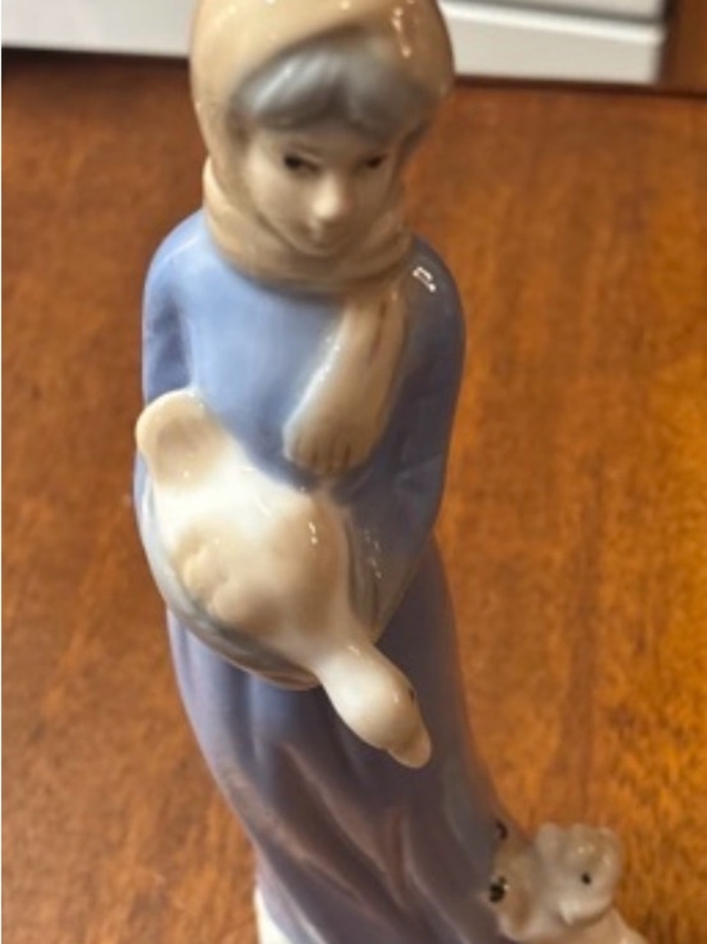 Porcelain Girl Figurine in Blue and Cream Holding Duck - Decorative Accent